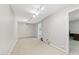Finished basement with neutral walls, carpet, and modern lighting, offering versatile space at 905 Balmoral Dr, Cary, NC 27511