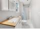 Bathroom featuring a vanity and shower with blue curtain at 905 Balmoral Dr, Cary, NC 27511