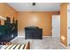 Cozy bedroom shows unique city-themed art, neutral carpet, and a dresser at 905 Balmoral Dr, Cary, NC 27511