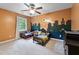 Playful bedroom with city-themed decor, two twin beds, and a ceiling fan at 905 Balmoral Dr, Cary, NC 27511