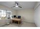 Bright office with a ceiling fan, desk, computer, and storage at 100 Maywood Way, Chapel Hill, NC 27516