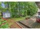 Backyard featuring a deck area with shed at 1014 Laurens Way, Knightdale, NC 27545