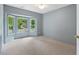 Bedroom featuring a bay window offering neighborhood views and natural light at 1014 Laurens Way, Knightdale, NC 27545