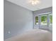 Comfortable bedroom with bay window offering neighborhood views and natural light at 1014 Laurens Way, Knightdale, NC 27545