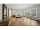 Empty bedroom with hardwood floors, lots of natural light and neutral walls at 1029 Dozier Way, Cary, NC 27518