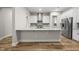 Spacious kitchen with a large island, granite countertops, stainless steel appliances at 1029 Dozier Way, Cary, NC 27518
