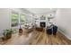 Bright and airy living room with a fireplace, built-in shelves, and large windows at 1029 Dozier Way, Cary, NC 27518