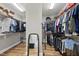 Spacious walk-in closet with custom shelving and ample storage space at 1029 Dozier Way, Cary, NC 27518