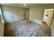 A carpeted bedroom with double closets and neutral walls at 10517 Brookside Reserve Rd, Raleigh, NC 27614