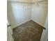 Walk in closet featuring carpet and white walls at 10517 Brookside Reserve Rd, Raleigh, NC 27614