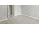 Bedroom featuring neutral carpeting, ensuite bathroom and large closet at 106 Eagle Crest Ln, Princeton, NC 27569