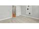 Bedroom with carpet, a built-in bookshelf, and a view into the hallway at 106 Eagle Crest Ln, Princeton, NC 27569
