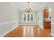 Bright dining area with hardwood floors, a chandelier, and natural light at 106 Eagle Crest Ln, Princeton, NC 27569