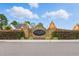 Elegant community entrance sign for Eagle Crest, framed by beautiful landscaping and copper accents at 106 Eagle Crest Ln, Princeton, NC 27569