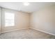 Bedroom with neutral carpet and natural light from window at 107 Kimeo Way, Garner, NC 27529