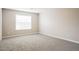Bedroom with neutral carpet and one window for natural light at 107 Kimeo Way, Garner, NC 27529