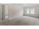 Spacious bedroom with plush carpet and natural light at 110 Gallery Park Dr, Franklinton, NC 27525