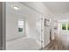 Bright living room with neutral walls, carpet, and French doors to another room at 110 Gallery Park Dr, Franklinton, NC 27525