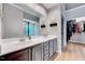 Bathroom features a double sink vanity, large mirror, and walk-in closet at 113 Fetzer Ct, Cary, NC 27513