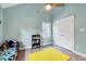 Bedroom with sloped ceilings, ceiling fan, closet, and a yellow rug at 113 Fetzer Ct, Cary, NC 27513