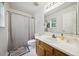 Bathroom featuring a single sink vanity, white countertop and shower with curtain at 117 Rack Ct, Willow Springs, NC 27592
