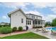 Charming backyard with a pool, spa and covered porch perfect for relaxing outdoors at 120 Hazel Alder Ct, Holly Springs, NC 27540