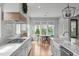 Bright, updated kitchen with breakfast nook and views of the landscaped yard at 120 Hazel Alder Ct, Holly Springs, NC 27540
