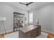 Bright, comfortable home office with hardwood floors and plenty of space at 120 Hazel Alder Ct, Holly Springs, NC 27540