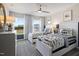 Charming bedroom featuring twin beds, soft lighting, and a window overlooking a lush landscape at 1213 Everton Ave, Durham, NC 27703