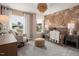 Charming Bedroom with crib, rocking chair, and decorative wallpaper creates a warm and inviting atmosphere at 1215 Everton Ave, Durham, NC 27703