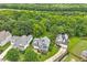 A peaceful neighborhood setting with beautiful homes and tree-lined streets at 1217 Heritage Greens Dr, Wake Forest, NC 27587