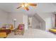 Bonus room featuring a ceiling fan, gray walls, carpet flooring, and a window at 1217 Heritage Greens Dr, Wake Forest, NC 27587