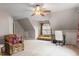 Bonus room featuring a ceiling fan, gray walls, carpet flooring, and a window at 1217 Heritage Greens Dr, Wake Forest, NC 27587