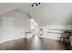 Bonus room featuring hardwood floors, a window, and built-in shelving at 1217 Heritage Greens Dr, Wake Forest, NC 27587