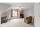 Spacious bonus room with a ceiling fan, desk area, seating, and ample natural light at 1217 Heritage Greens Dr, Wake Forest, NC 27587