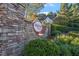 Charming community entrance with stone signage for Heritage at Wake Forest, highlighting a well-maintained neighborhood at 1217 Heritage Greens Dr, Wake Forest, NC 27587