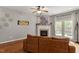 Comfortable living room with fireplace and backyard patio access for easy entertaining at 1217 Heritage Greens Dr, Wake Forest, NC 27587
