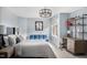 Comfortable bedroom features a cozy daybed, workspace, and shelving for a vibrant atmosphere at 123 Trellingwood Dr, Morrisville, NC 27560
