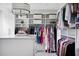 Spacious walk-in closet with ample storage, custom shelving, and hanging racks for organization at 123 Trellingwood Dr, Morrisville, NC 27560
