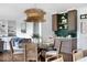 Elegant dining room with stylish light fixture and views into the living room at 123 Trellingwood Dr, Morrisville, NC 27560