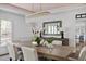 Formal dining room featuring stylish table setting, decorative mirror and lighting fixture at 123 Trellingwood Dr, Morrisville, NC 27560