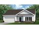 Charming single-Gathering home with a well-manicured lawn, a garage, and black and white accents at 1234 Sirius Drive Lot 31 Dr, Sanford, NC 27330