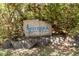 Solterra, a cohousing community sign with beautiful landscaping and natural surroundings at 126 Solterra Way, Durham, NC 27705