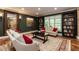Cozy living room with fireplace, built-in shelving, and comfortable seating at 126 Solterra Way, Durham, NC 27705