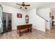 Bright dining room showcases wood floors, a classic grandfather clock and a staircase to the second floor at 150 Sherrill Place Ln, Garner, NC 27529