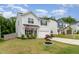 Well-maintained home featuring a manicured lawn, inviting curb appeal, and an American flag at 150 Sherrill Place Ln, Garner, NC 27529