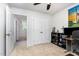 Home office with multiple monitors, file cabinets, and view to the hallway, perfect for a productive workspace at 150 Sherrill Place Ln, Garner, NC 27529