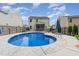Backyard features a refreshing in-ground pool with patio, seating, and a screened porch for outdoor entertaining at 150 Sherrill Place Ln, Garner, NC 27529