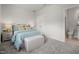 Bright bedroom featuring a comfortable bed, soft lighting, and a tranquil aesthetic at 1515 Tamarisk Ln, Durham, NC 27703