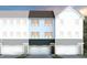 Charming townhome showcasing a two-car garage and inviting front entry at 1515 Tamarisk Ln, Durham, NC 27703